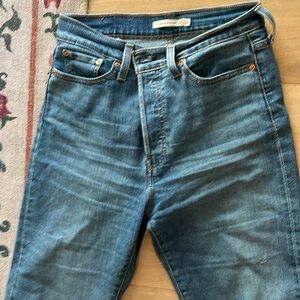 Like new Levi jeans with really fun buttons